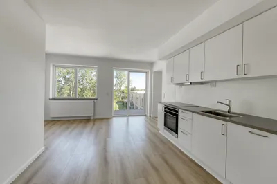 Charmerende 2-værelses lejlighed med privat altan i historiske Seminariehaven